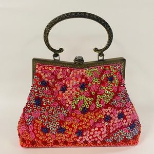 Gemstone and sequin evening bag with chain strap